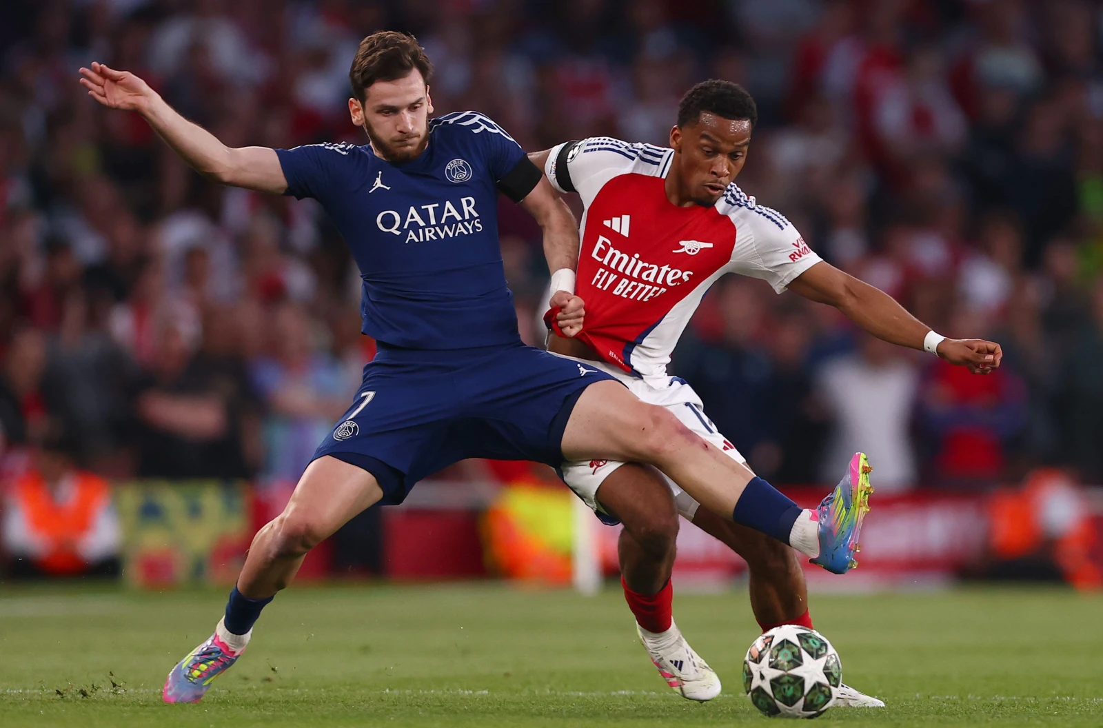 Jurrien Timber of Arsenal and Khvicha Kvaratskhelia of Paris Saint-Germain seen in action