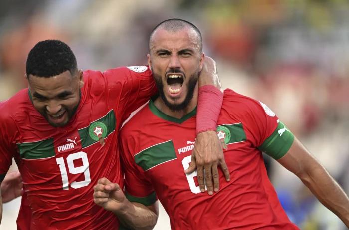 Romain Saiss of Morocco celebrates his goal with teammate Youssef En-Nesyri against Tanzania Jan 17, 2024