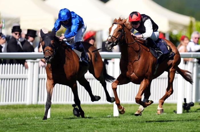 Kyprios ridden by Ryan Moore (right) on their way to winning the Gold Cup