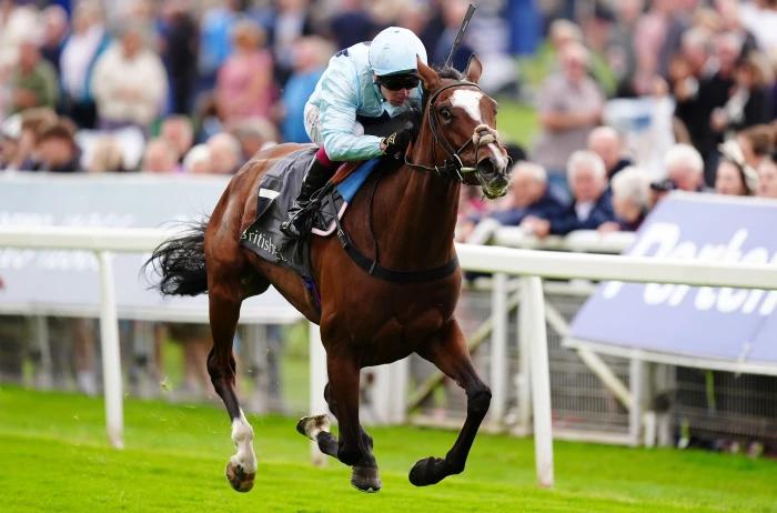 Scenic ridden by Oisin Murphy on their way to winning the Sir Henry Cecil Galtres Stakes