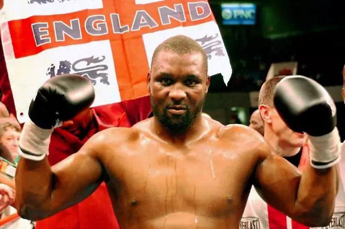 Danny Williams celebrates defeating Mike Tyson (Credit: PA Images)