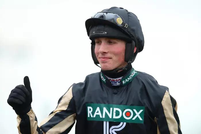 Harry Cobden celebrates a win during the 2019 Randox Health Grand National Festival at Aintree Racecourse