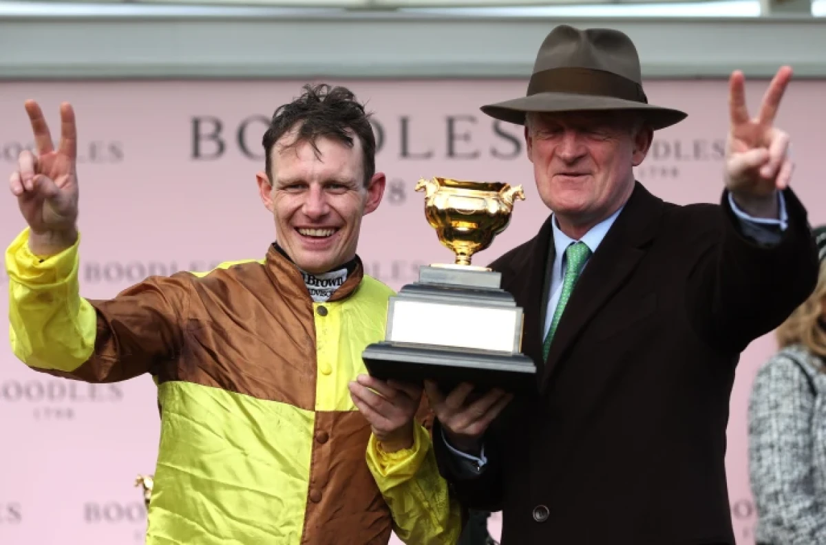 Paul Townend and trainer Willie Mullins with the Gold Cup Trophy after winning with Galopin Des Champs