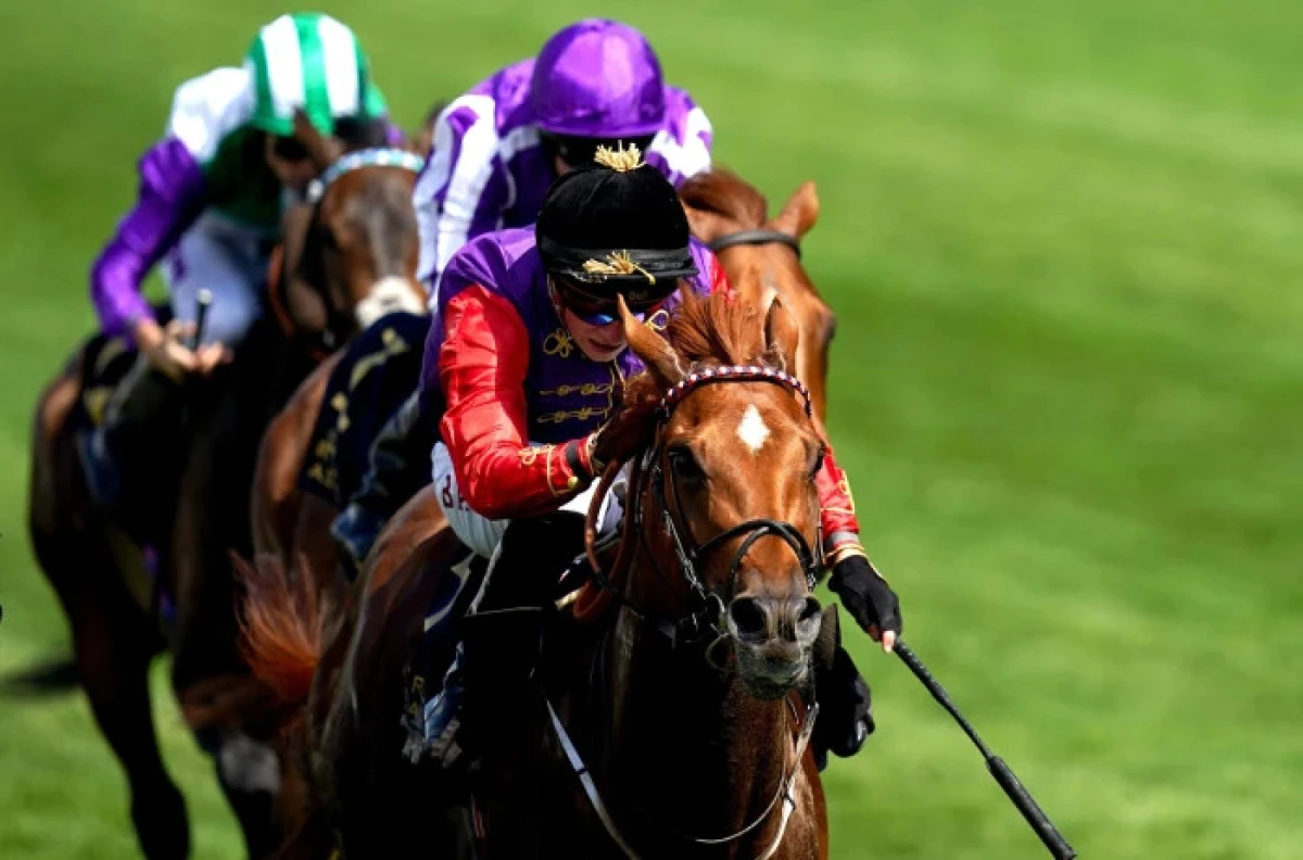 Desert Hero ridden by Tom Marquand on their way to winning the King George V Stakes - June 2023