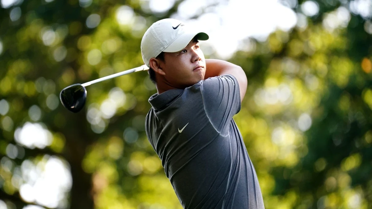 Tom Kim of South Korea leads