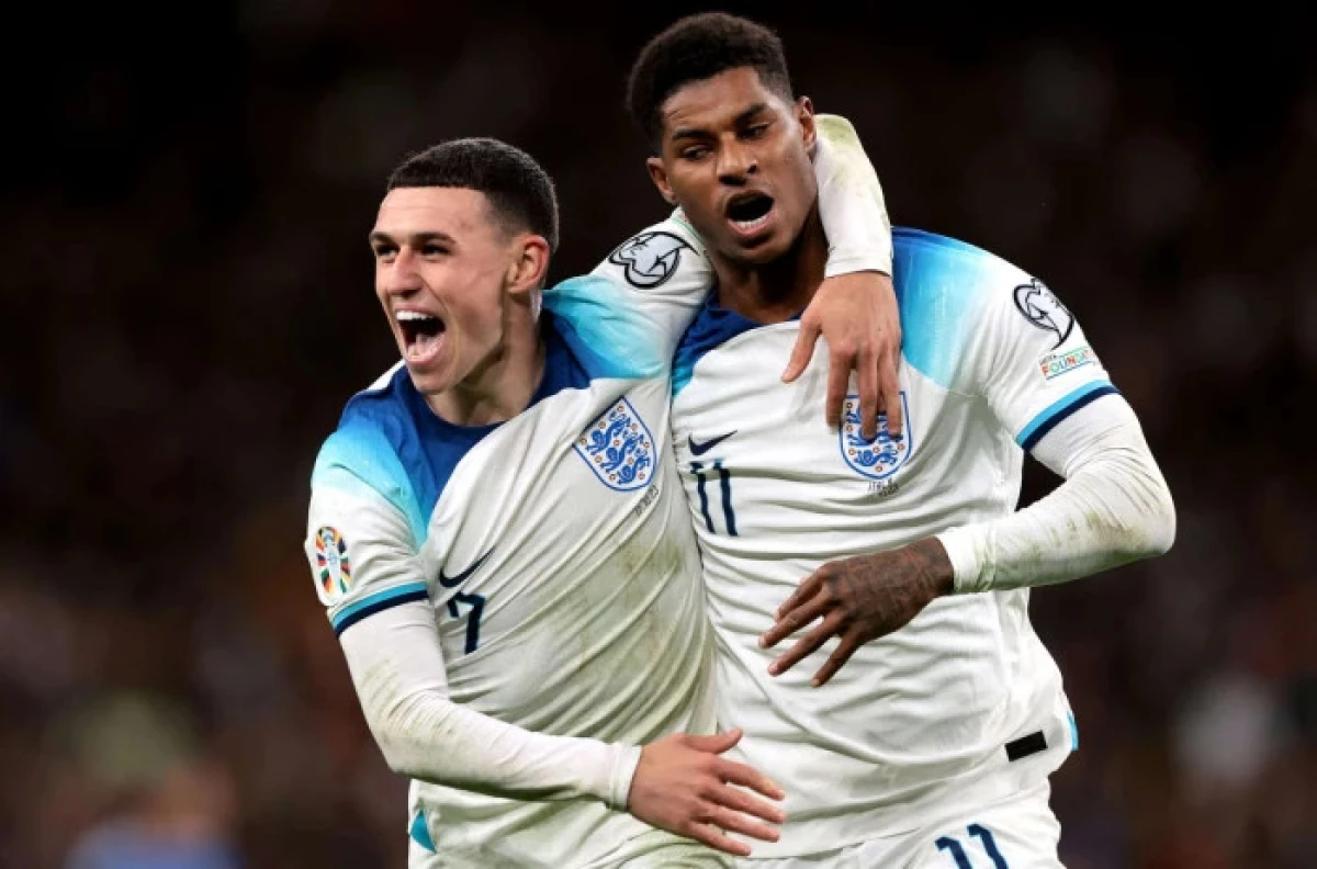 Marcus Rashford of England celebrates with team mate Phil Foden after scoring for England - Oct 2023