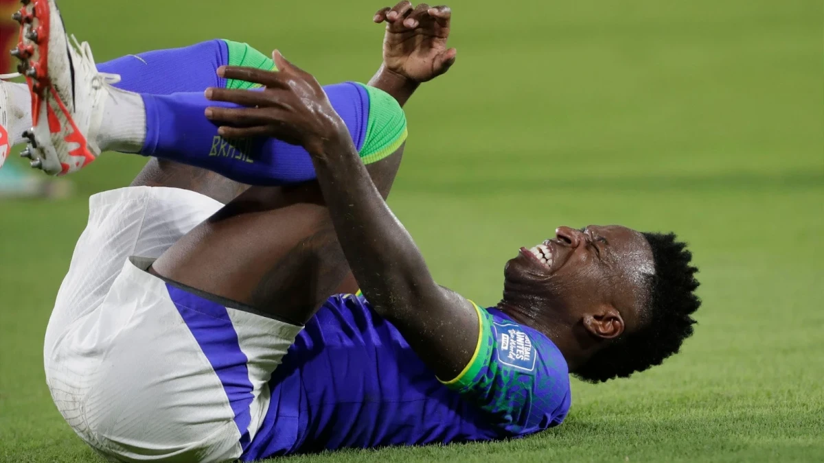 Vinicius Junior of Brazil grimaces in pain
