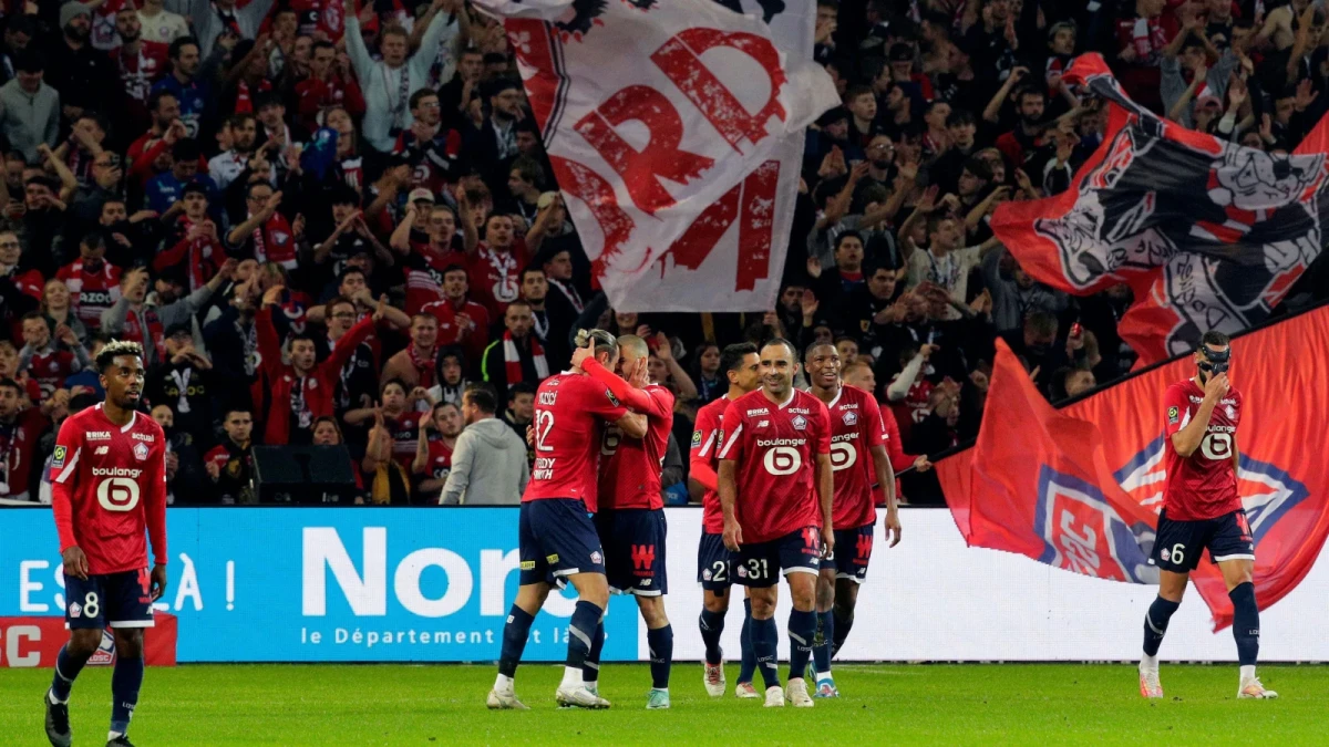 Lille players celebrate at Pierre-Mauroy Stadium