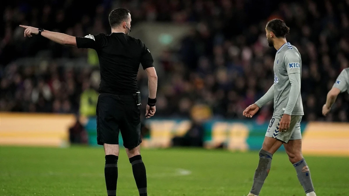 Referee Chris Kavanagh orders Everton's Dominic Calvert-Lewin off the field
