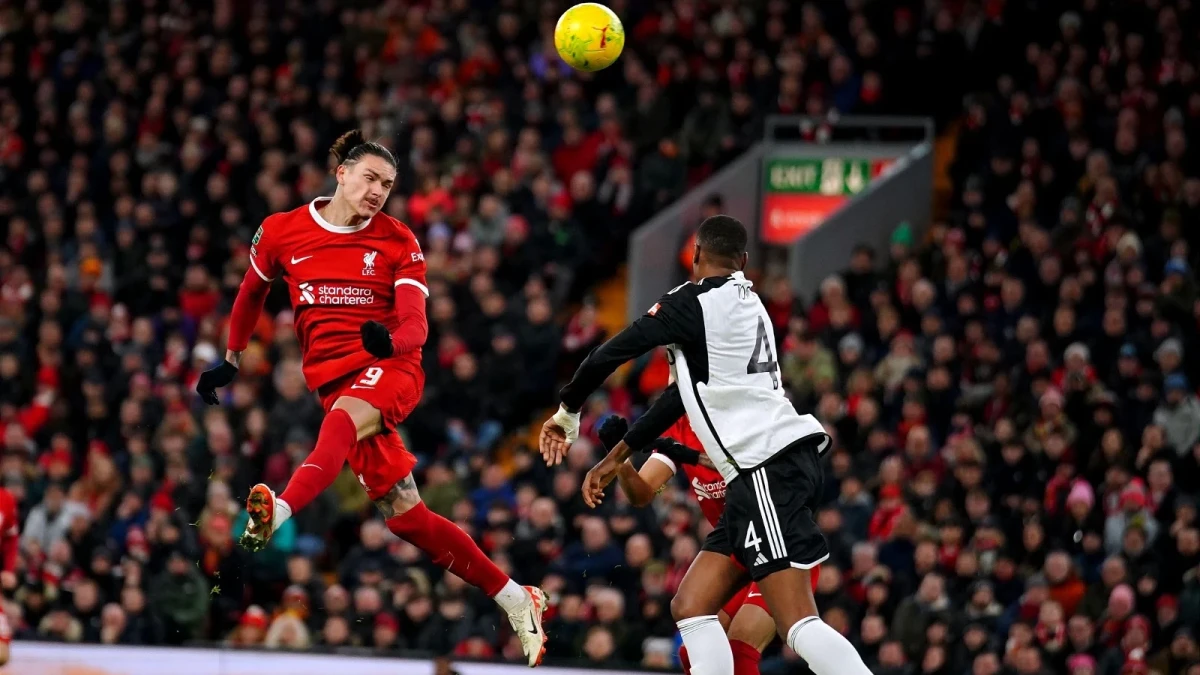 Liverpool's Darwin Nunez attempts to head the ball towards the goal