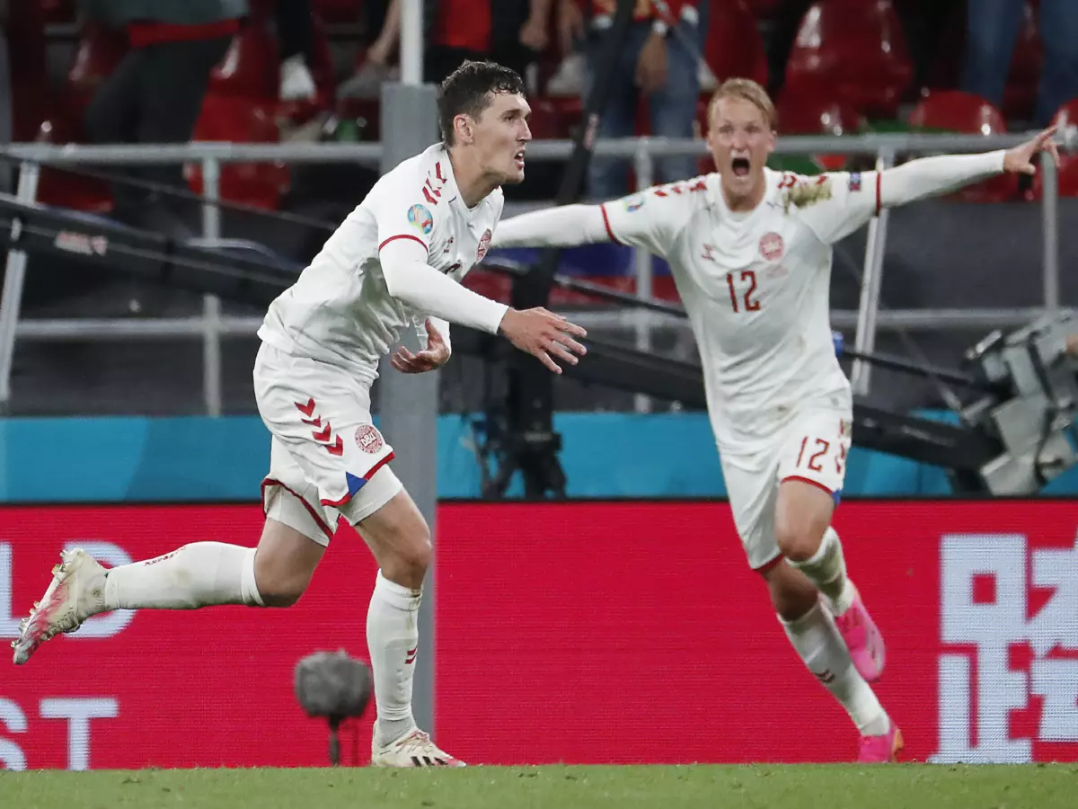 Denmark's Andreas Christensen (L), who has scored a goal, and Kasper Dolberg are in action in the UEFA Euro 2020 Group B football match against Russia at Parken Stadium.