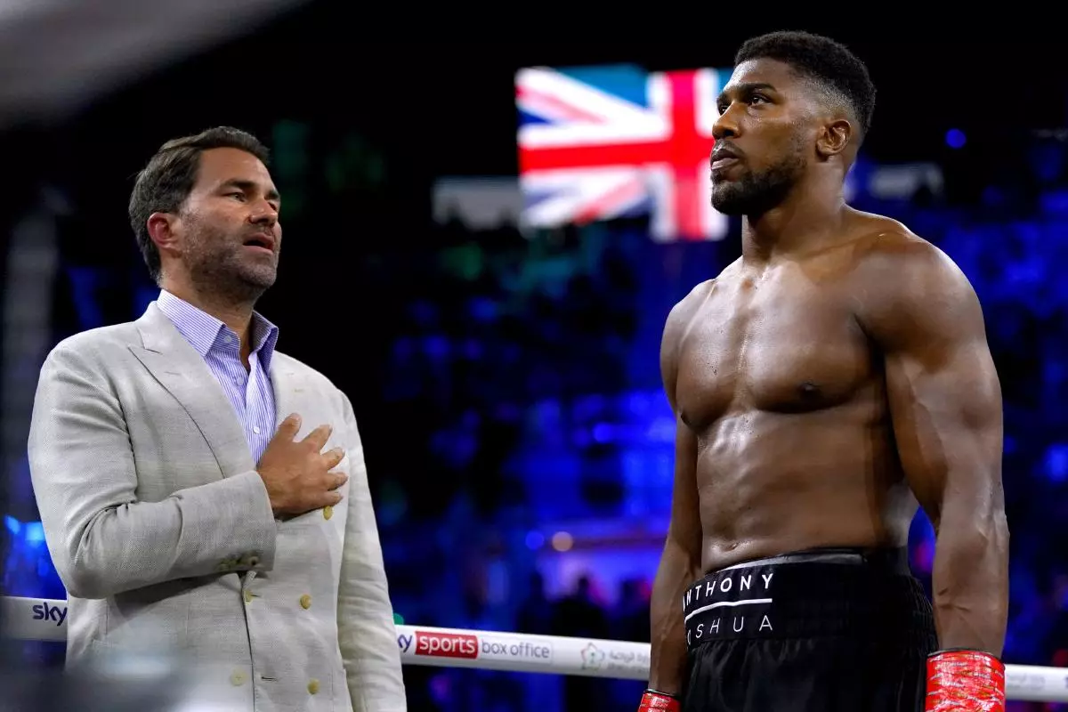 Anthony Joshua (right) and boxing promoter Eddie Hearn