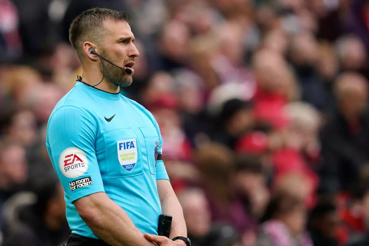 Assistant referee Constantine Hatzidakis during the Premier League match at Anfield - April 2023