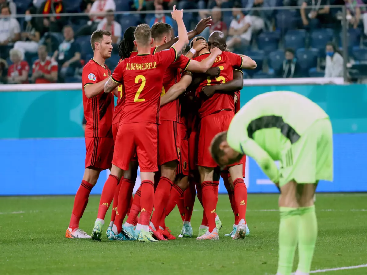 Belgium squad celebrates their second against Russia
