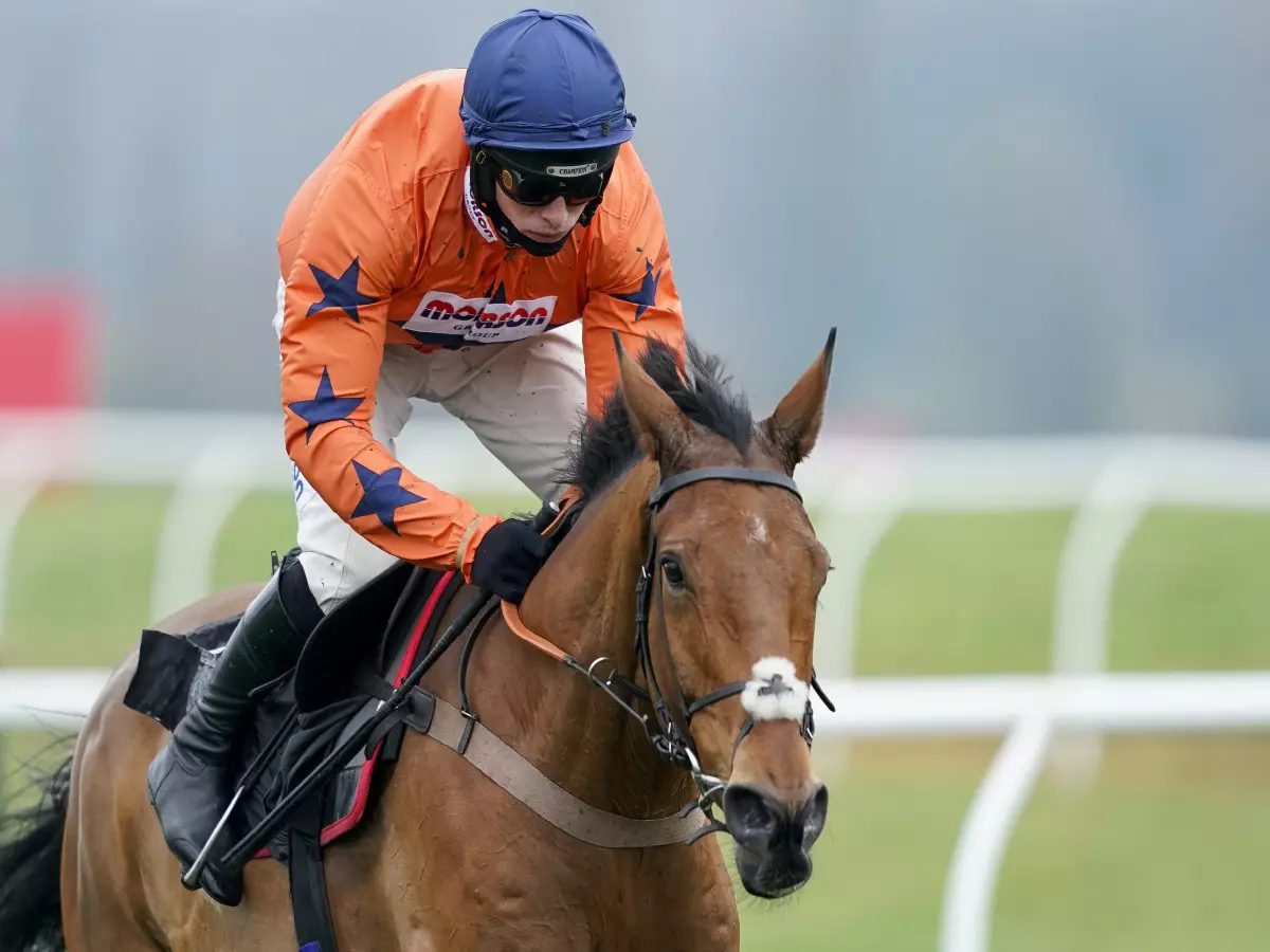 Bravemansgame ridden by Harry Cobden wins The Play Ladbrokes 5-A-Side On Football Novices' Hurdle at Newbury Racecourse.