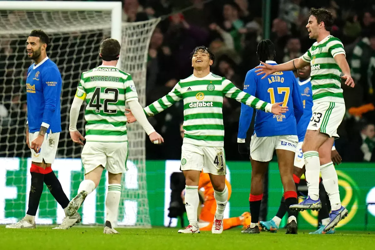 Celtic's Reo Hatate celebrates scoring their side's first goal of the game during the cinch Premiership match at Celtic Park, Glasgow.