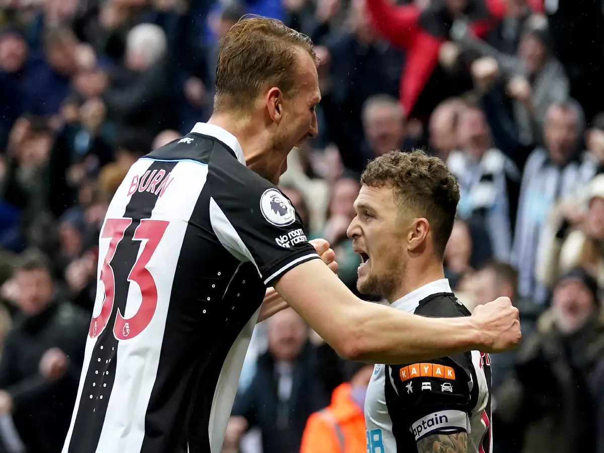 Dan Burn and Kieran Trippier celebrate Newcastle's goal vs Villa