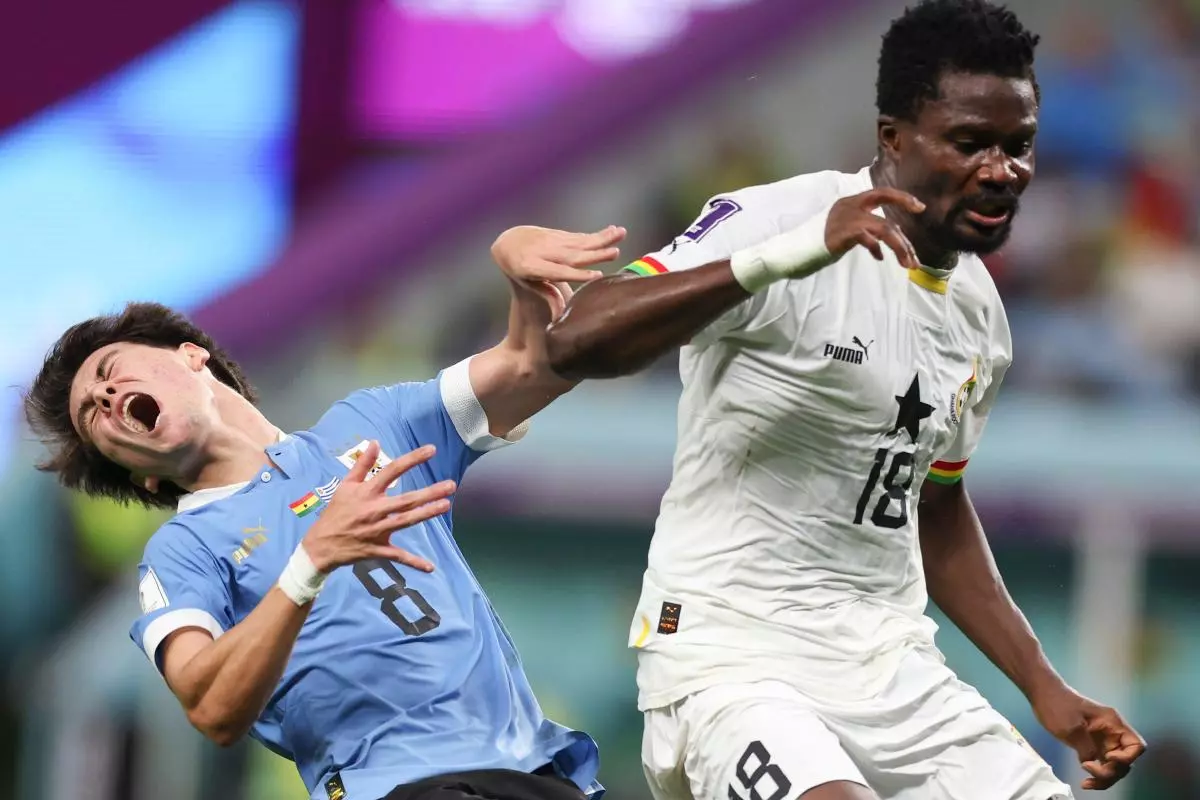Daniel Amartey of Ghana vies with Facundo Pellistri of Uruguay