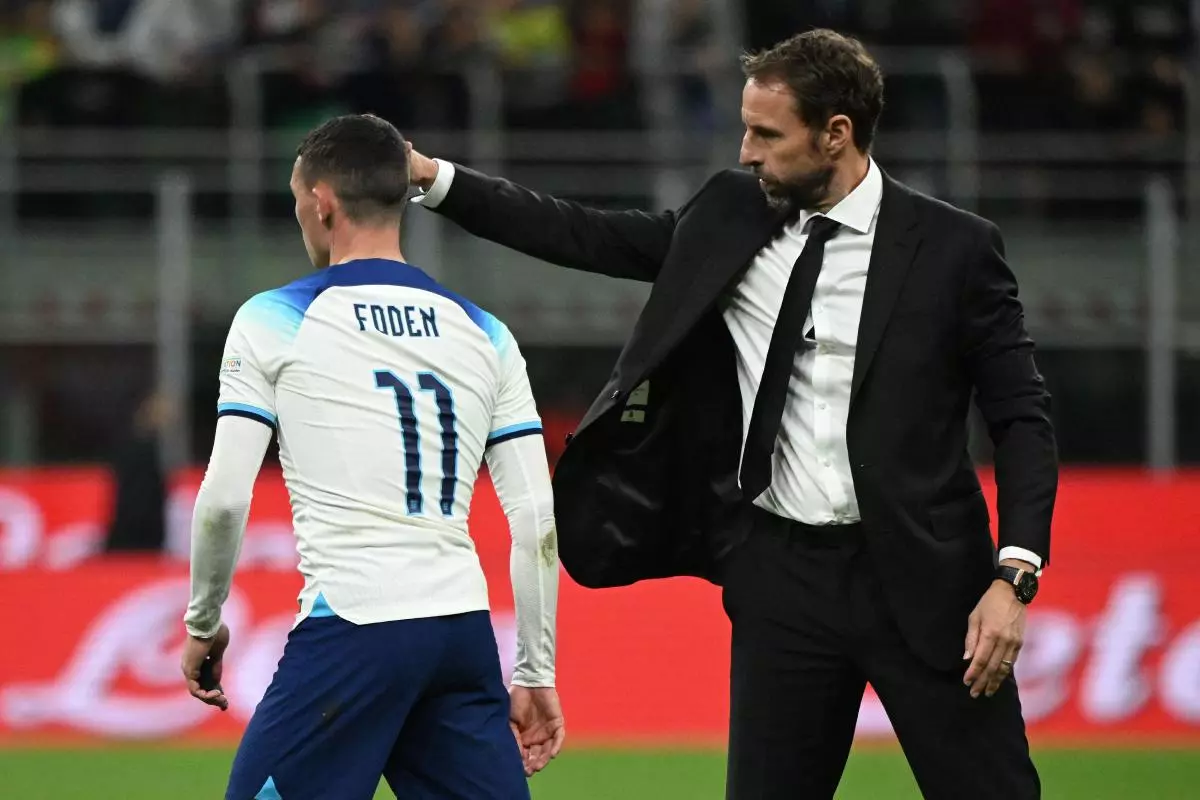 England manager Gareth Southgate and Phil Foden