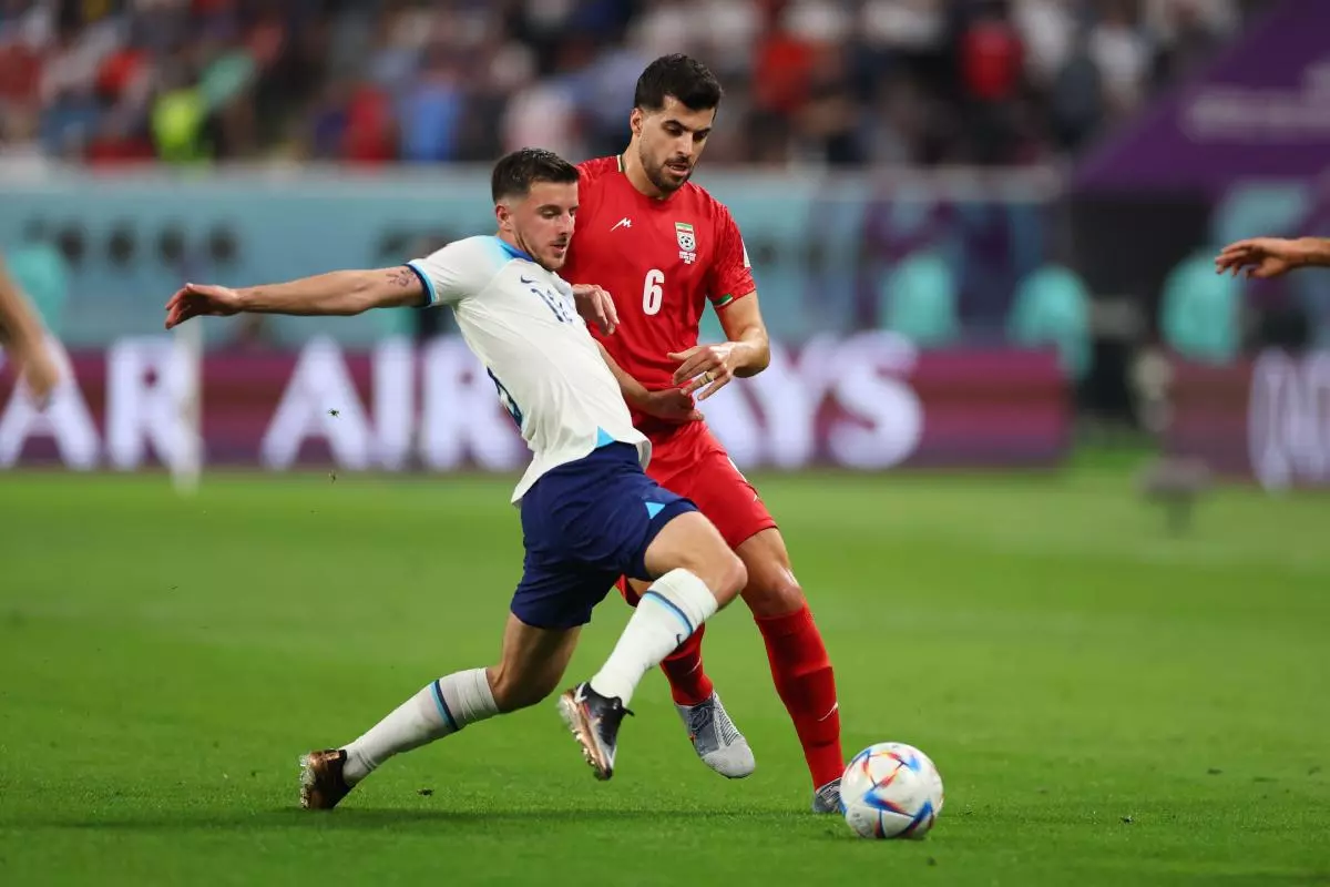 England midfielder Mason Mount making a tackle at the World Cup