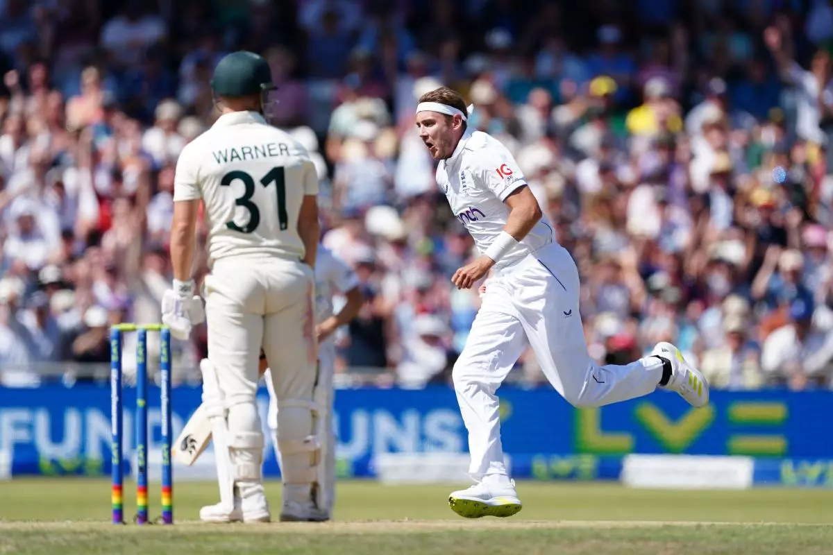 England's Stuart Broad celebrates after taking the wicket of Australia's David Warner - July 2023