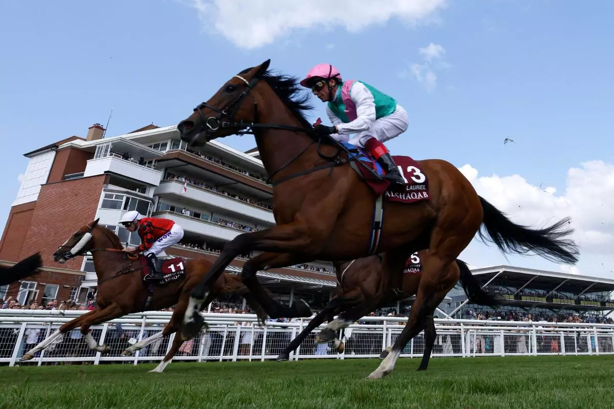 Frankie Dettori crosses the line on Laurel in the Al Shaqab Lockinge Stakes - May 2023