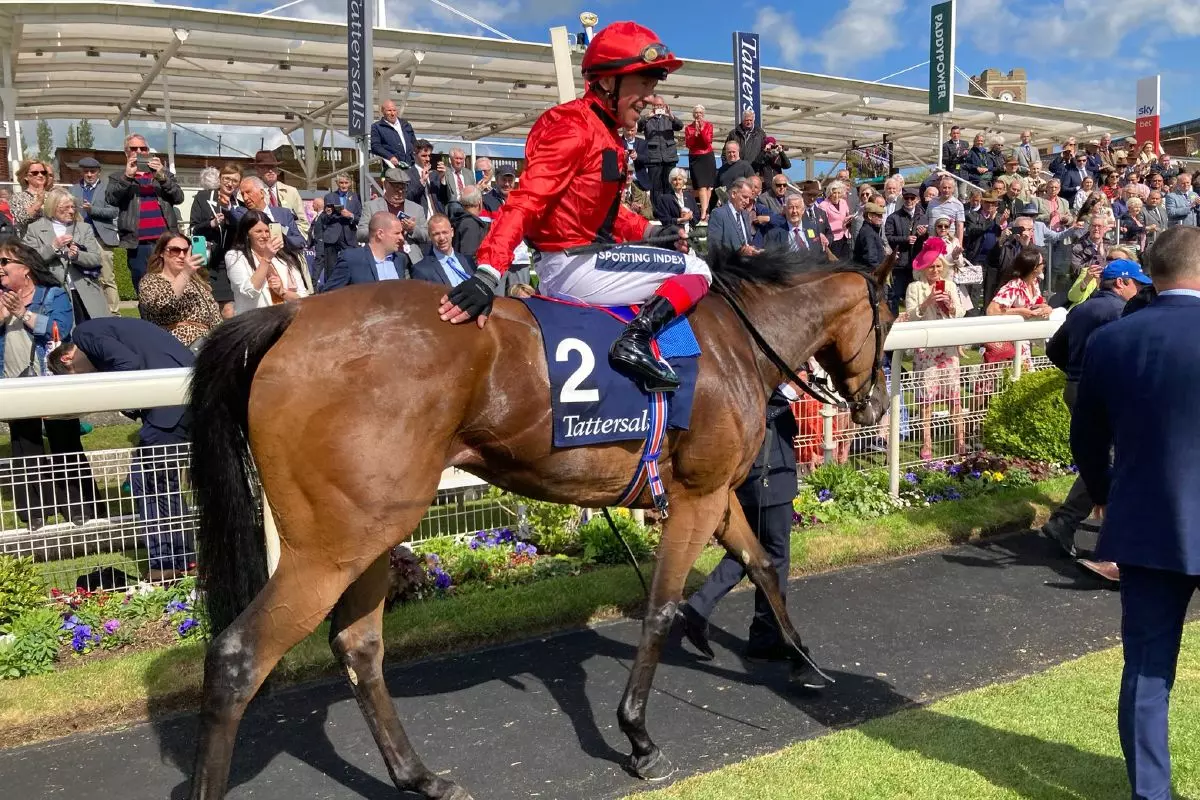 Emily Upjohn and Frankie Dettori after winning the Musidora