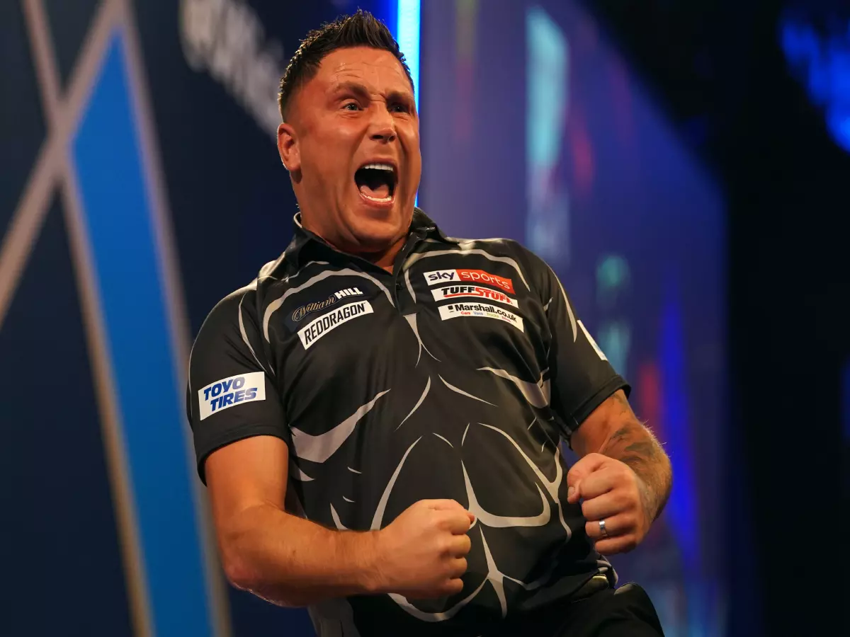 Gerwyn Price reacts during his match against Ritchie Edhouse on day one of the William Hill World Darts Championship at Alexandra Palace, London. Picture date: Wednesday December 15, 2021.