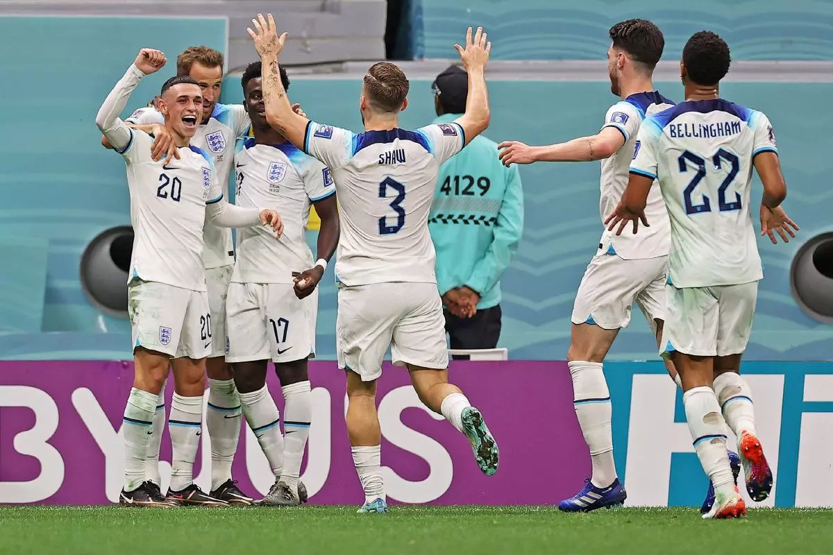 Harry Kane of England celebrates his goal with team-mates