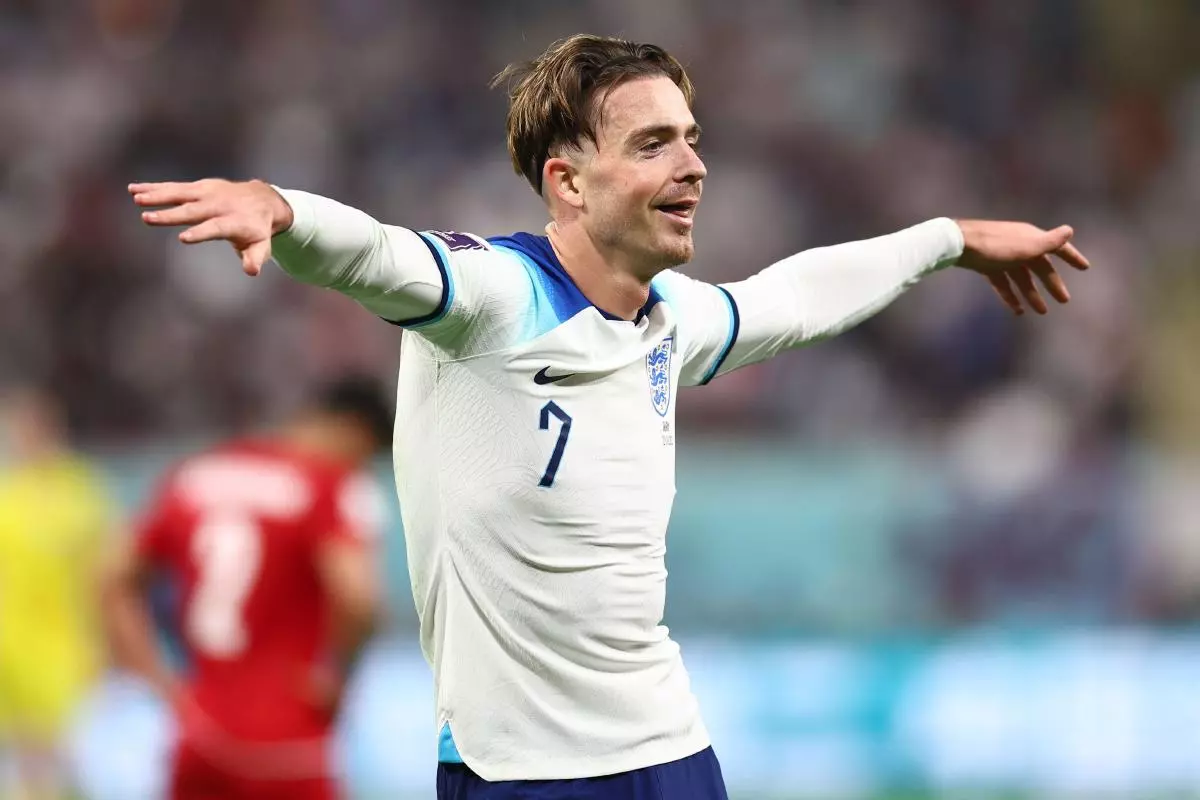 Jack Grealish of England celebrates scoring the sixth goal