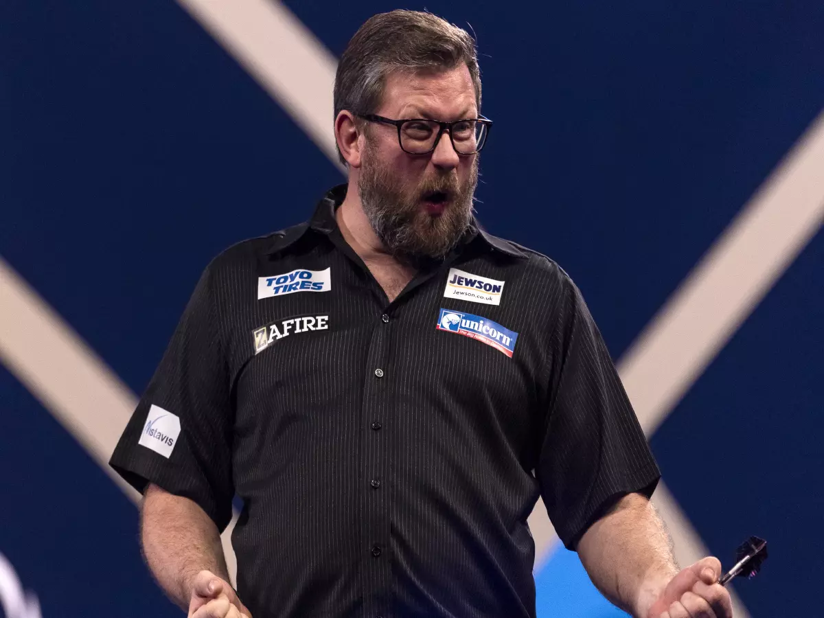James Wade celebrates beating Martijn Kleermaker during day thirteen of the William Hill World Darts Championship at Alexandra Palace, London. Picture date: Thursday December 30, 2021.
