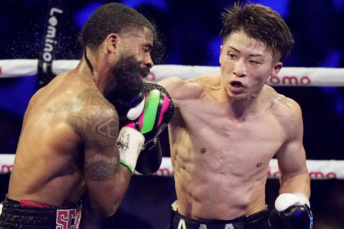 Japanese boxer Naoya Inoue (R) and Stephen Fulton of the United States fight - July 2023