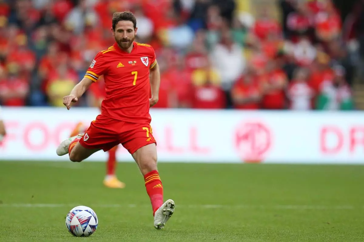 Joe Allen of Wales in action