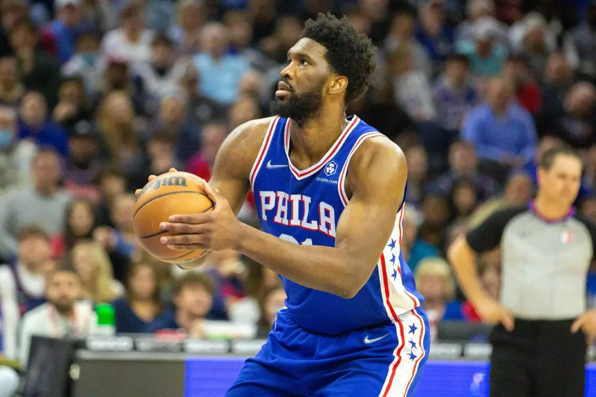 Joel Embiid takes free shot during a Philadelphia 76ers NBA game