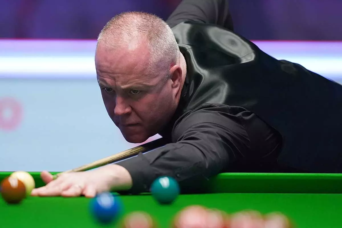 John Higgins overcomes embarrassment to secure victory