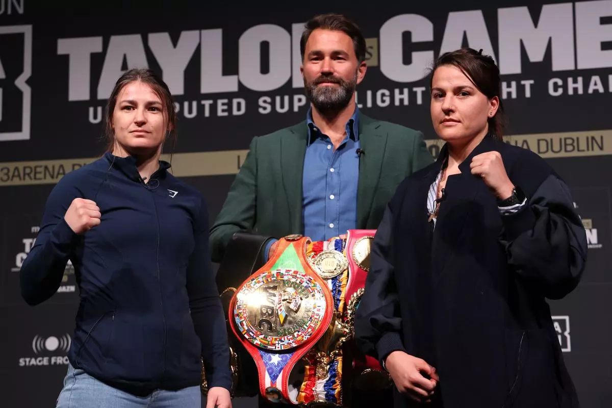 Katie Taylor (left) with Chantelle Cameron, with promoter Eddie Hearn