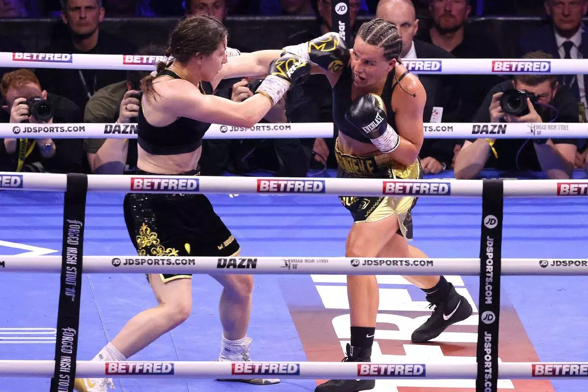 Katie Taylor (left) in action against Chantelle Cameron for the undisputed Super-Lightweight World Titles at the 3Arena in Dublin - May 2023