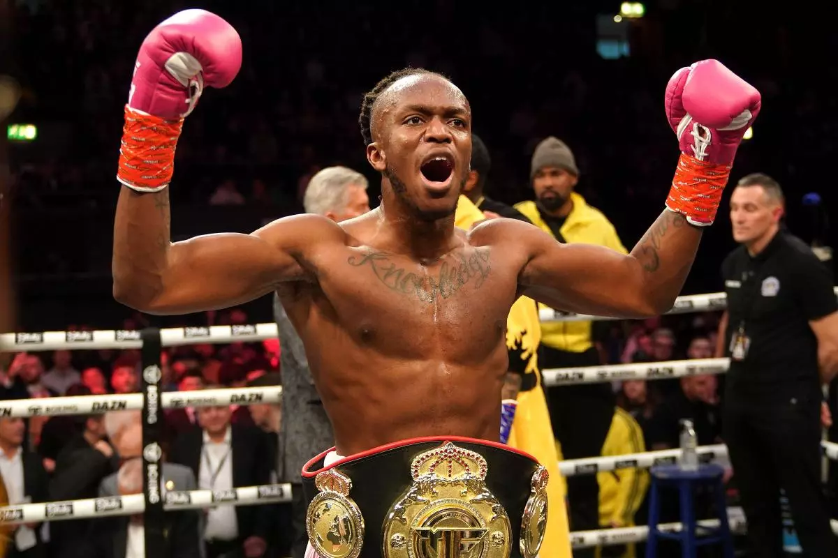KSI celebrates victory in the cruiserweight bout against FaZe Temperrr at the OVO Arena Wembley,