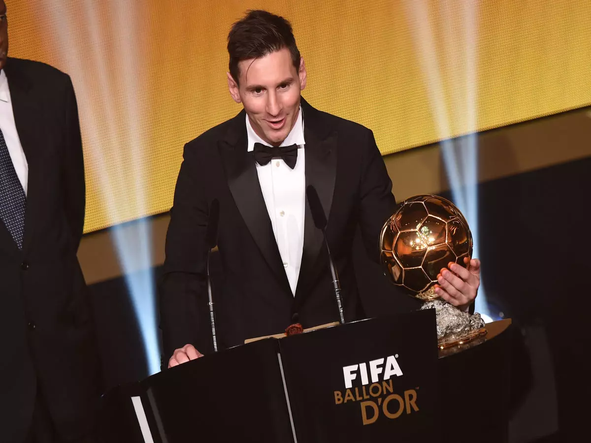 Lionel Messi with the Ballon d'Or in 2016
