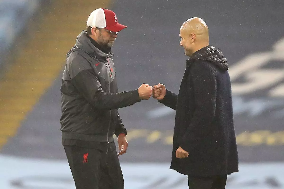 Liverpool manager Jurgen Klopp (left) and Manchester City manager Pep Guardiola