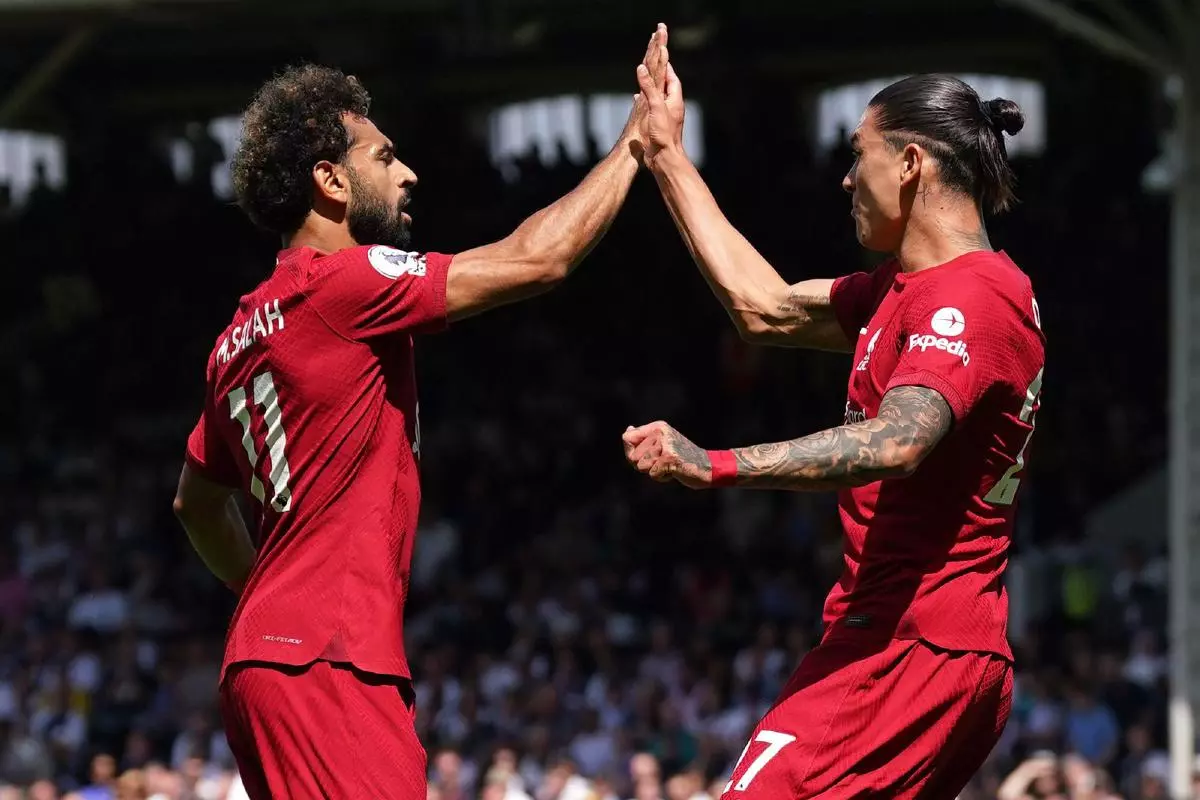 Liverpool's Darwin Nunez (right) celebrates with Mohamed Salah