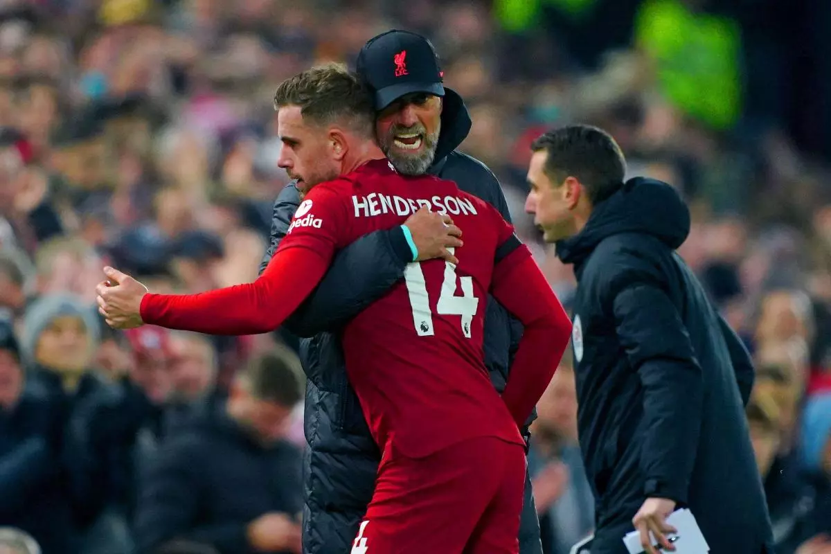 Liverpool's Jordan Henderson hugs manager Jurgen Klopp