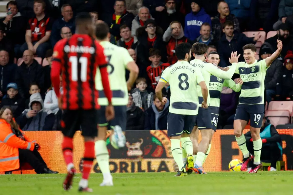 Manchester City's Julian Alvarez celebrates with team-mates