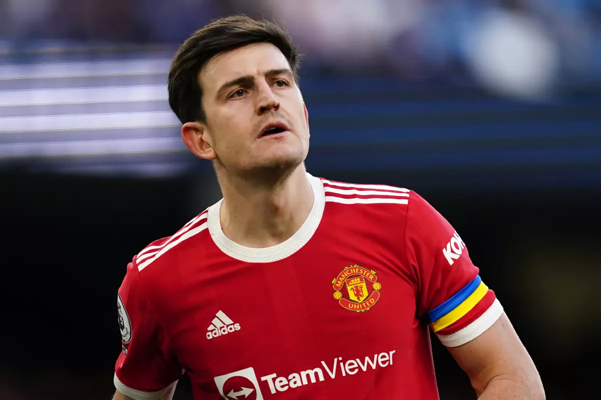 Manchester United's Harry Maguire wearing a Ukraine flag armband during the Premier League match at the Etihad Stadium, Manchester.