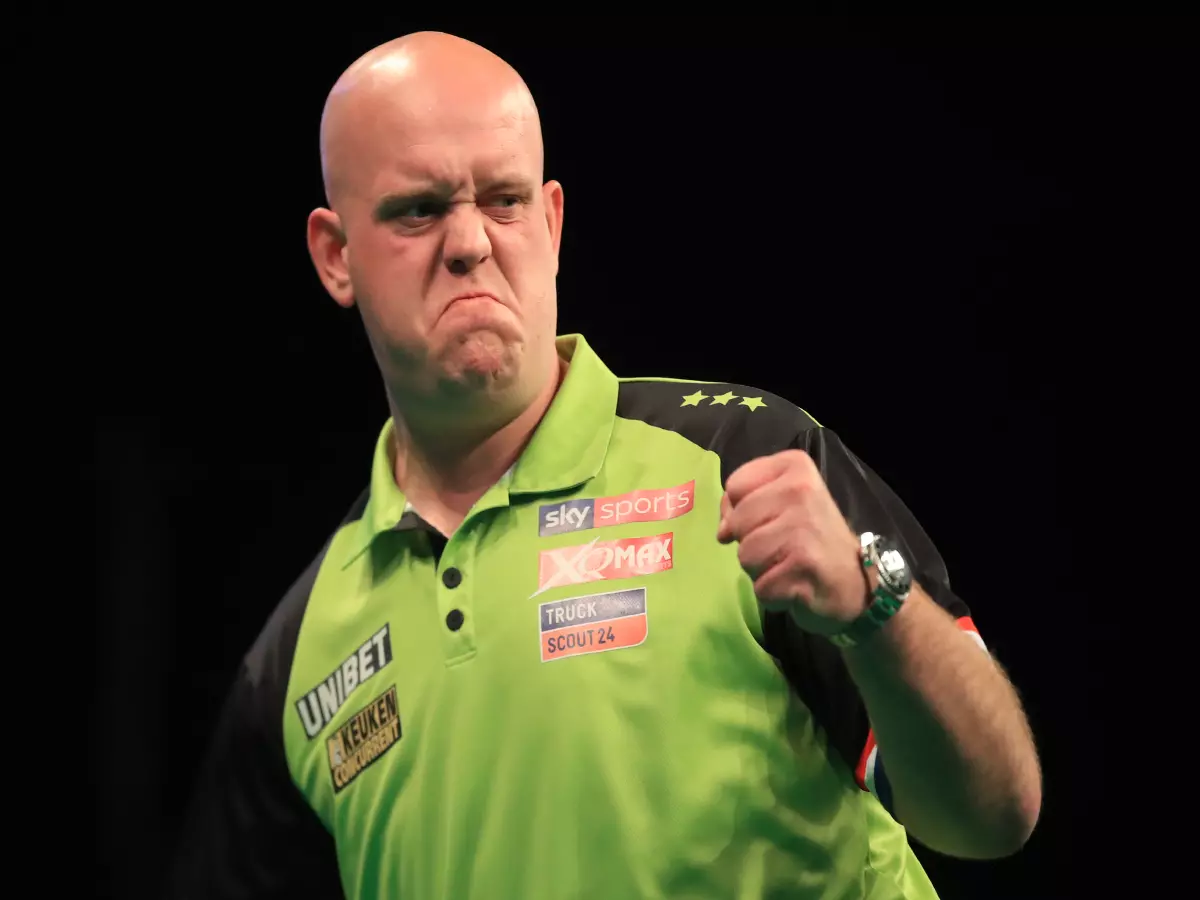 Michael Van Gerwen celebrates in his semi-final against Daryl Gurney during the Premier League Play-Offs at The O2, London.