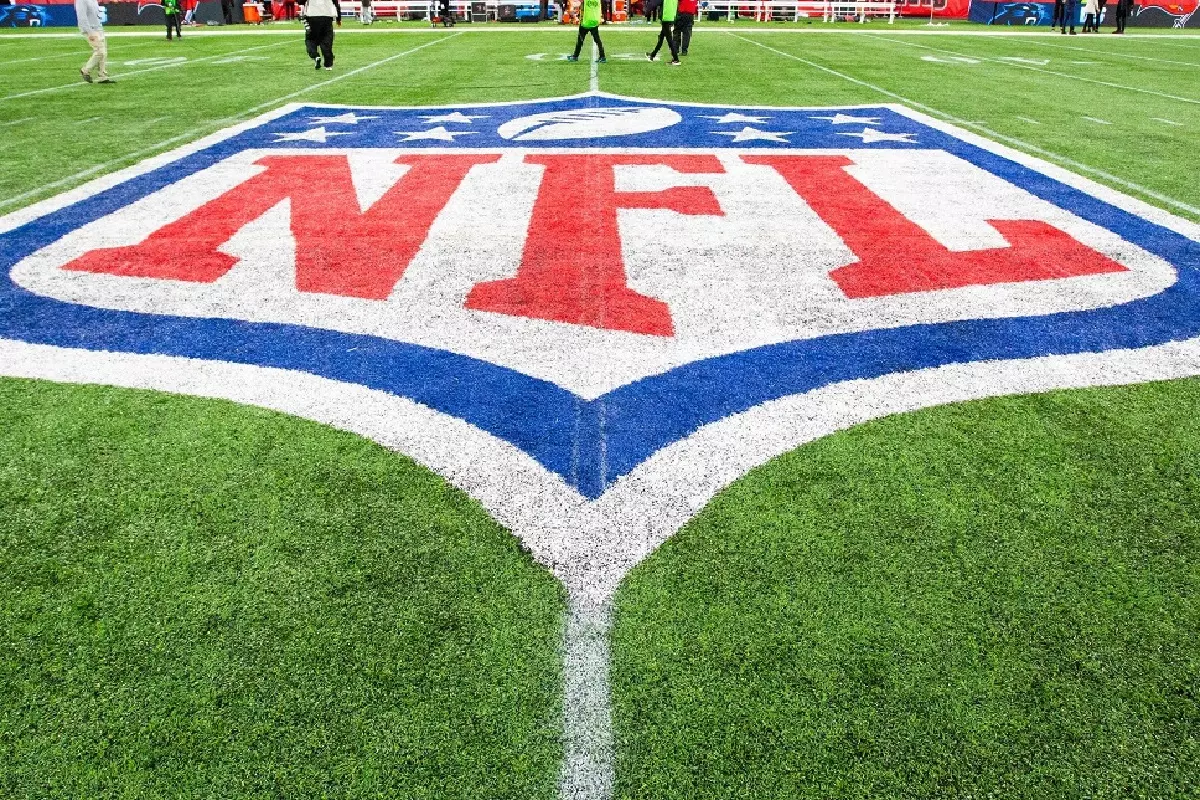 The NFL shield on the field