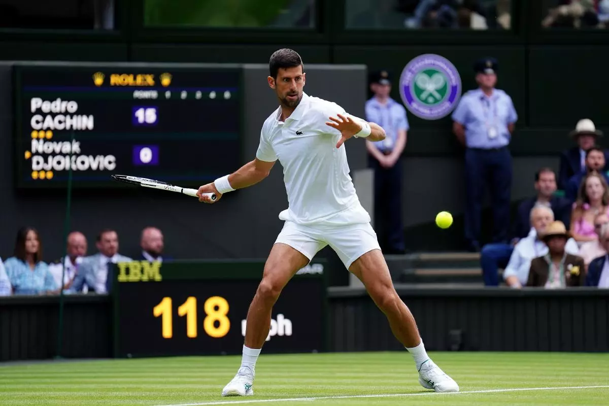 Novak Djokovic in action against Pedro Cachin in the opening round of Wimbledon - July 2023