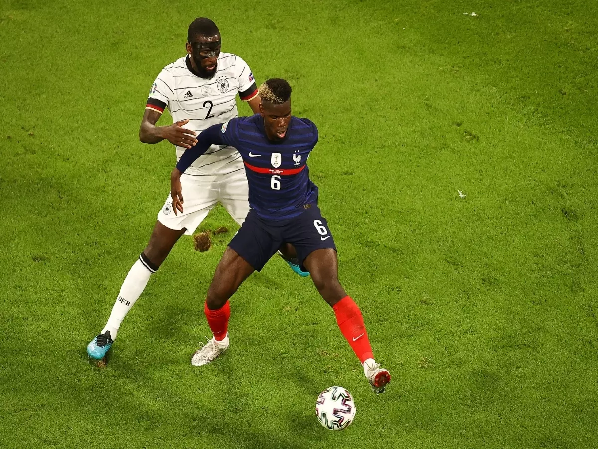 Paul Pogba protects the ball from Antonio Rudiger, France vs Germany 2021