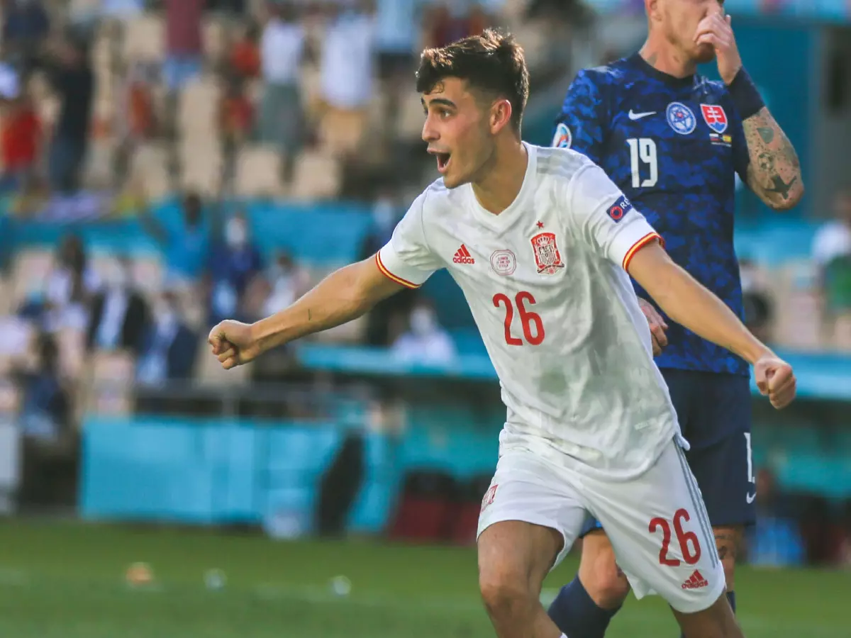 European Championship, Slovakia - Spain, preliminary round, Group E, Matchday 3 at Estadio de la Cartuja. Spain's Pedri (l) celebrates after scoring a goal, behind him Juraj Kucka of Slovakia