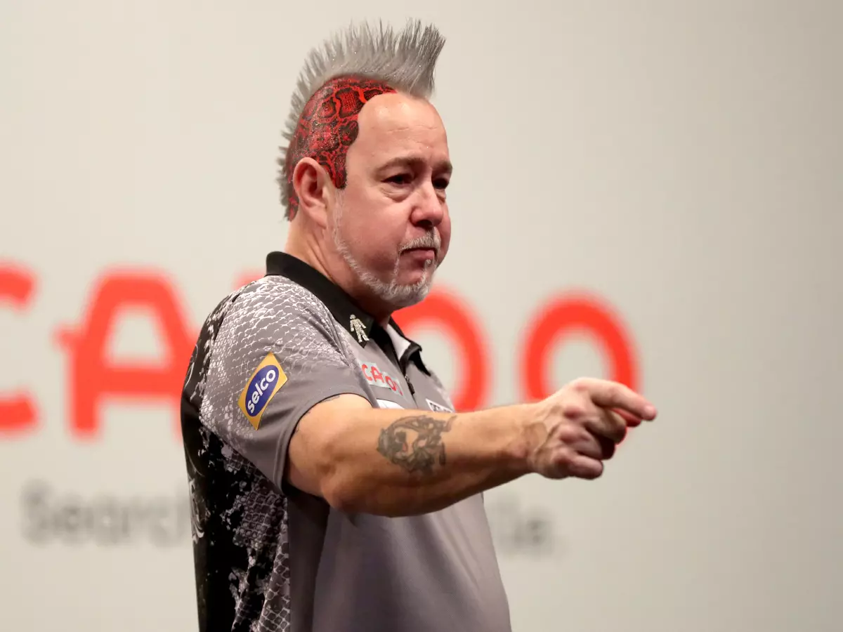 Peter Wright celebrates after winning his Semi Final against Michael Smith at the Aldersley Leisure Village, Wolverhampton. Picture date: Sunday November 21, 2021.